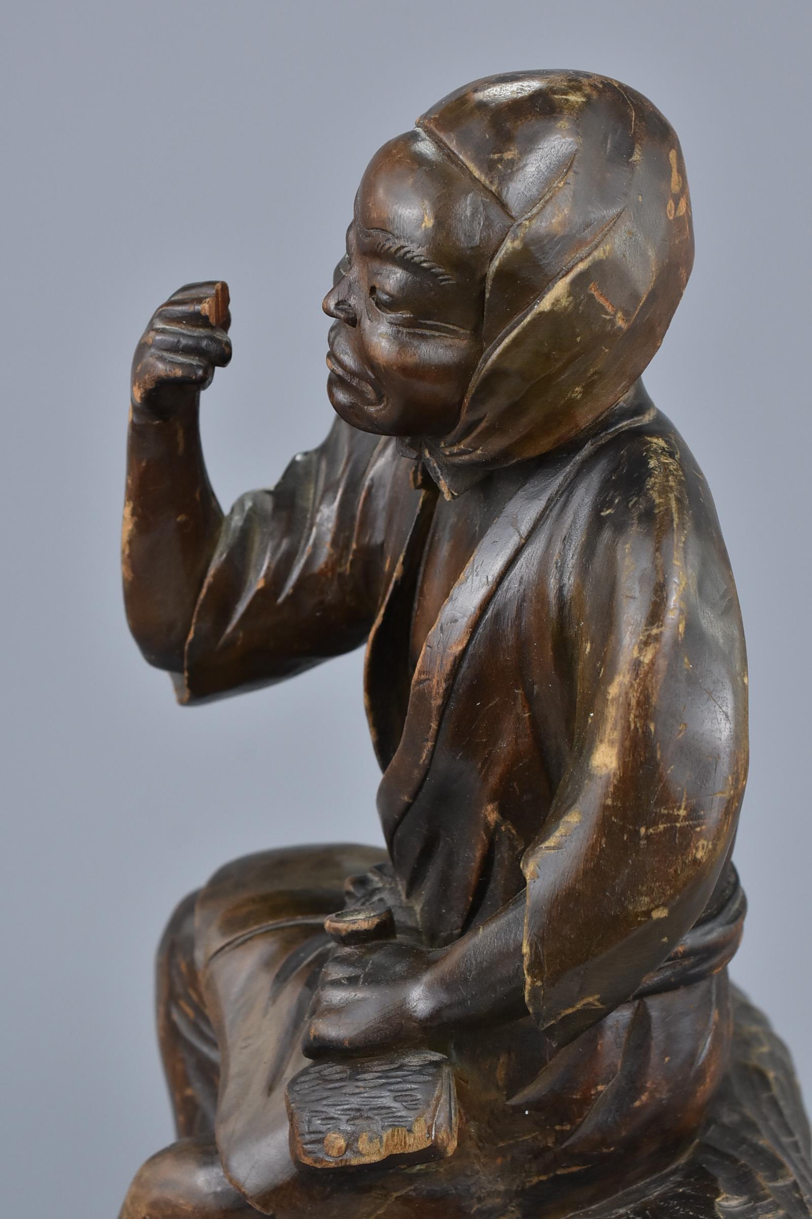 A Japanese Carved Wooden Figure, 19th Century - Image 6 of 7