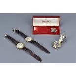 Three Omega wrist watches