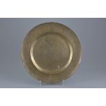 A Chinese polished bronze dish with incised decoration