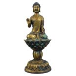 A Chinese Gilt Bronze figure of Buddha