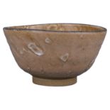A Japanese 19th Century Karatsu Kawakujira Pottery Tea Bowl