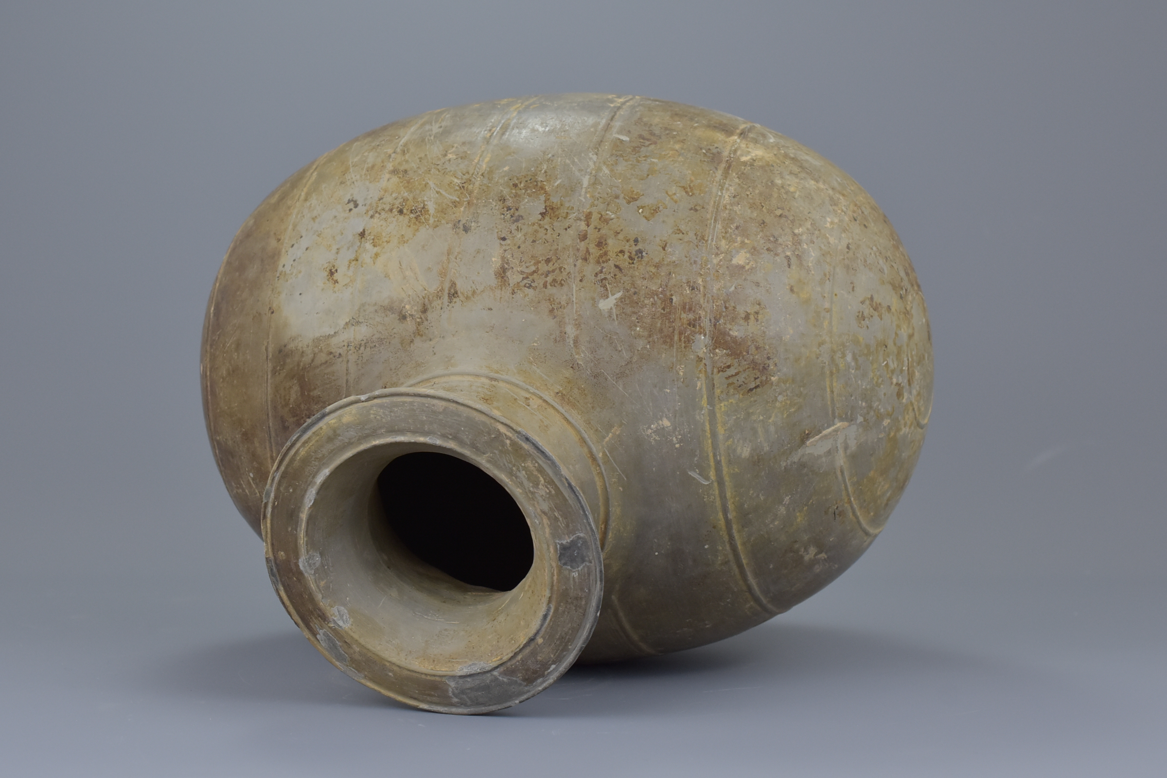 A Chinese Qin / Early Western Han Dynasty Burnished Pottery Cocoon Jar - Image 7 of 8