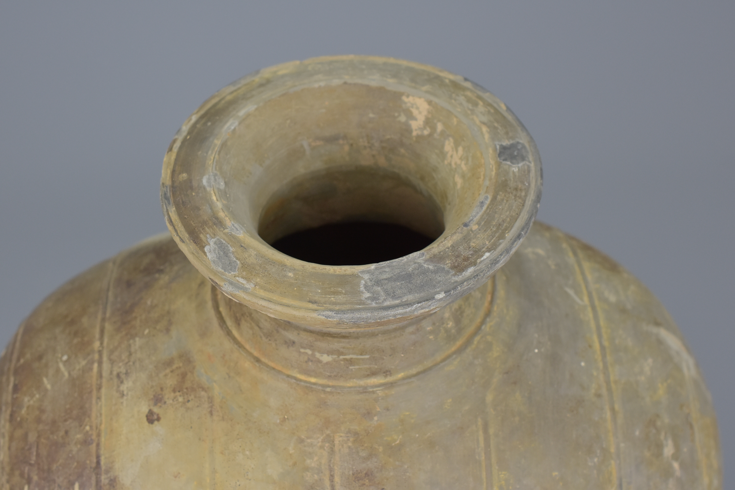 A Chinese Qin / Early Western Han Dynasty Burnished Pottery Cocoon Jar - Image 8 of 8