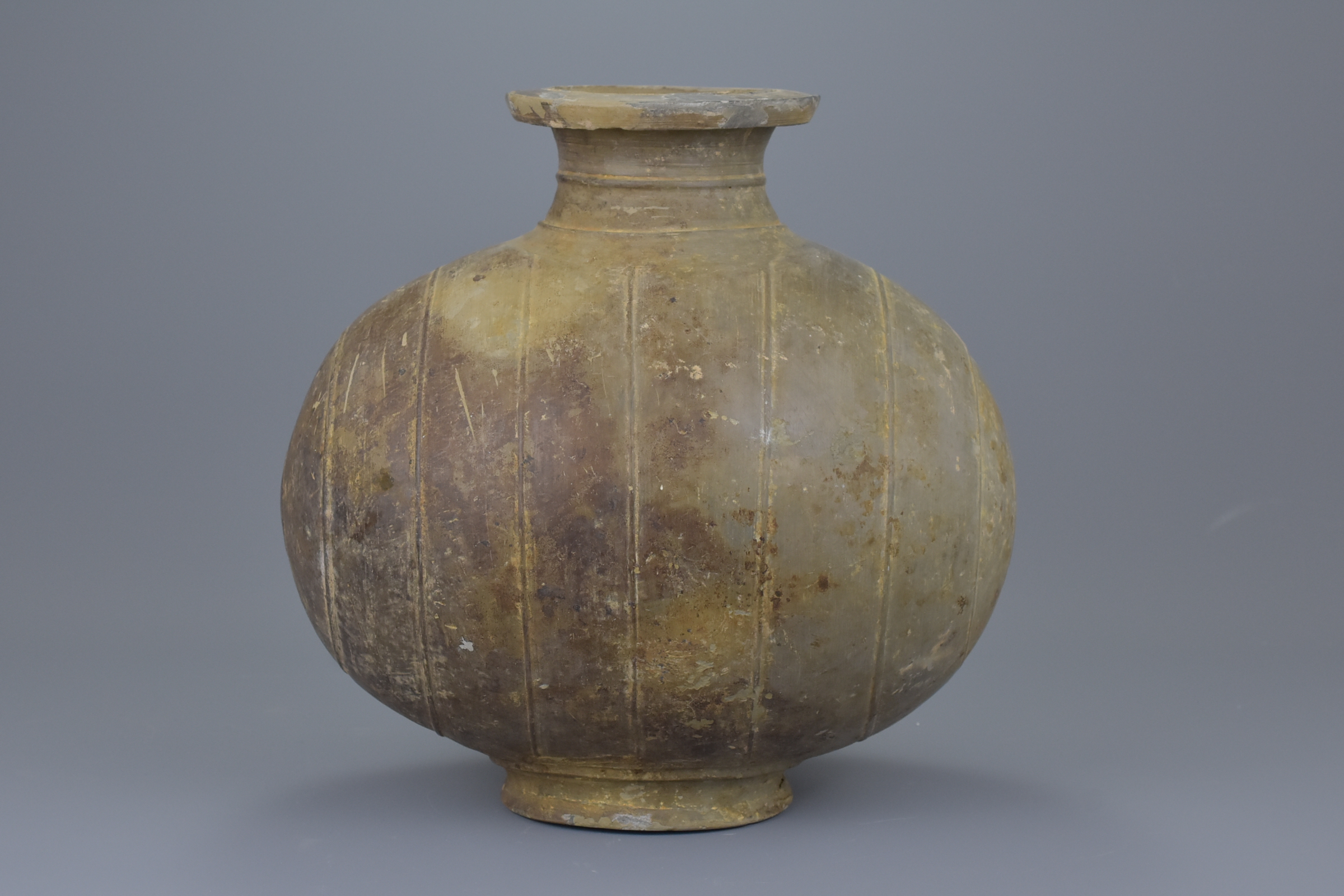 A Chinese Qin / Early Western Han Dynasty Burnished Pottery Cocoon Jar - Image 2 of 8