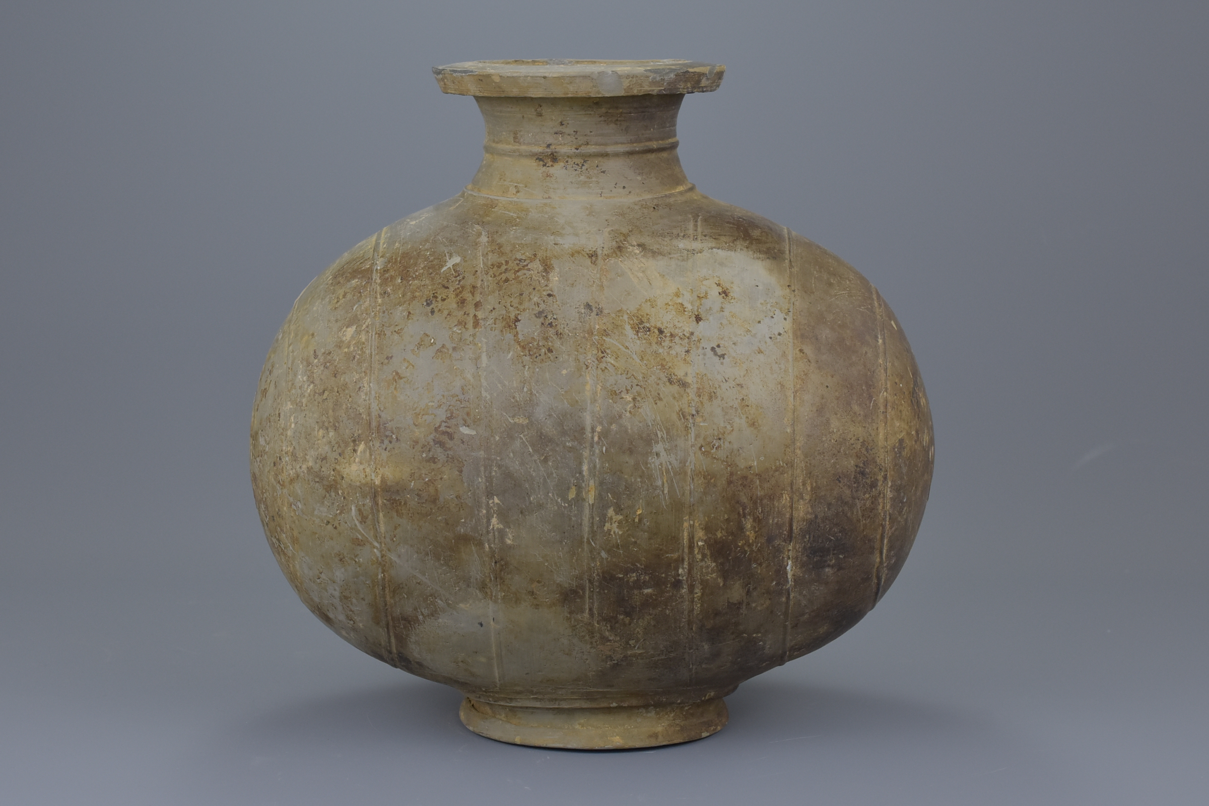 A Chinese Qin / Early Western Han Dynasty Burnished Pottery Cocoon Jar - Image 4 of 8