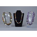 Five vintage coloured stone bead necklaces with various agate and amethyst beads