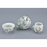 Three 19/20th C. Chinese Famille rose porcelain bird feeders in various forms