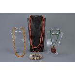 Three coral beaded necklaces