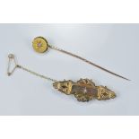 An antique circa 1900 15ct gold and diamond tie pin