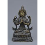 A Tibetan bronze figure of a Buddha Avalokiteshvara
