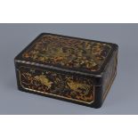 A Japanese lacquer and gilt box and cover on tortoise shell