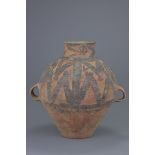 A Chinese Neolithic painted pottery jar (2300-2000BC)
