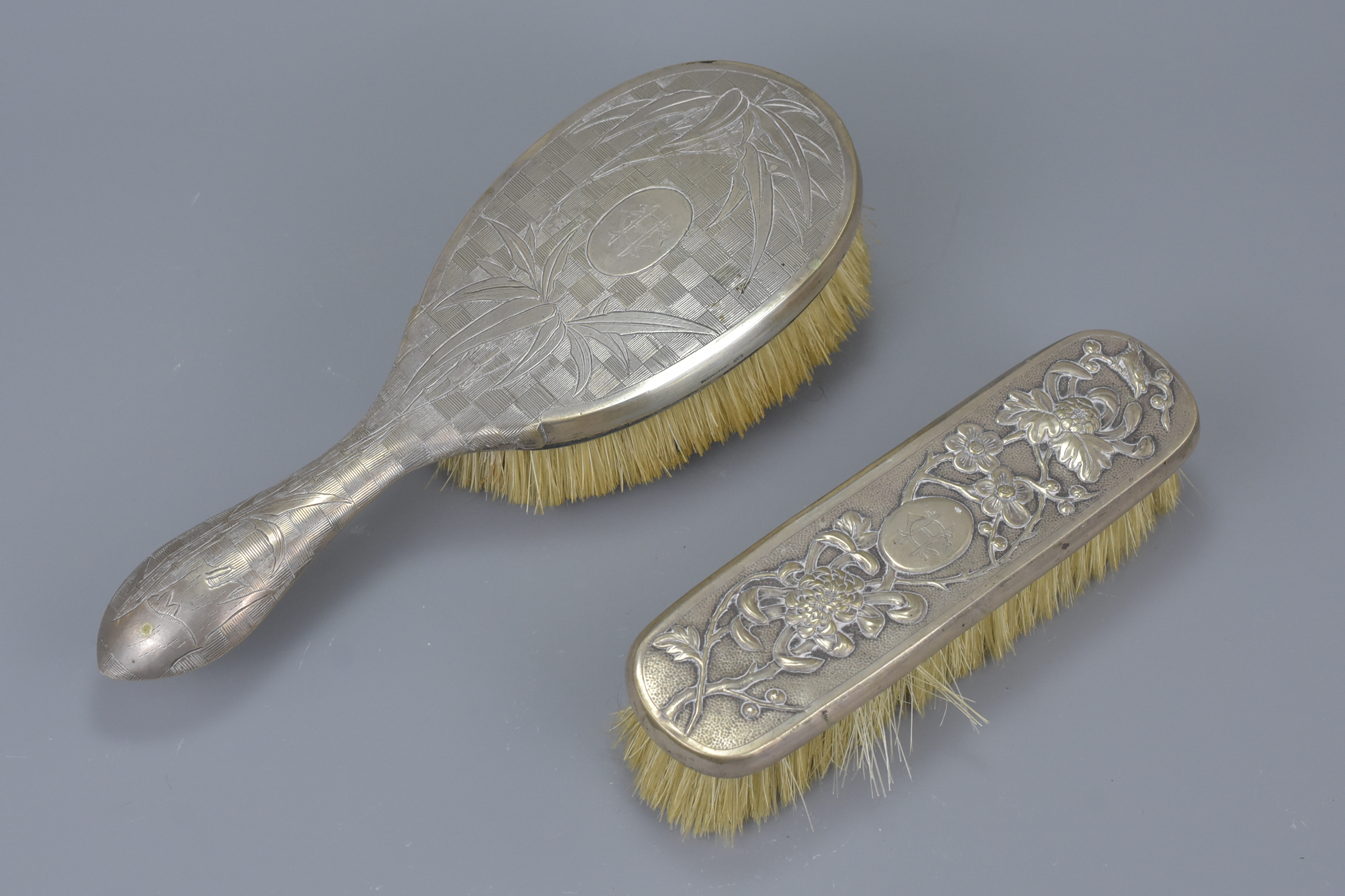 Two Chinese early 20th C. Silver cased brushes