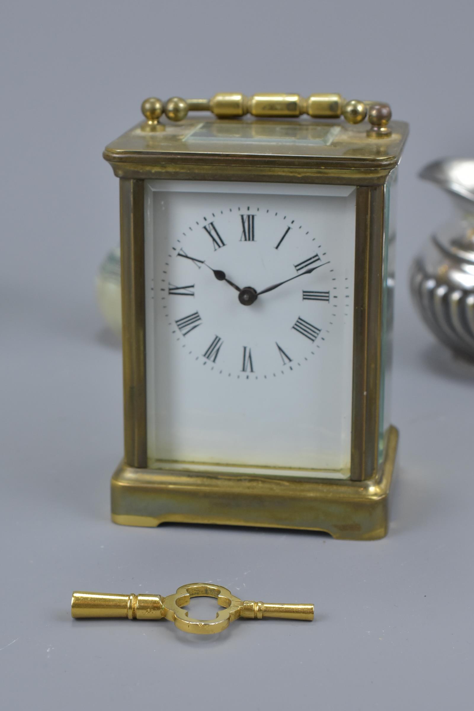 A carriage clock together with a silver plated ite - Image 4 of 5