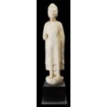 A Chinese 6th C. Northern Qi. White marble figure of Buddha. 90CM tall