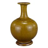 A Chinese Liao Dynasty (907-1125) pottery Amber-Glazed Long Neck bottle vase