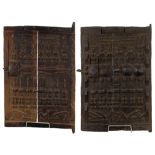 Two West African Dogon carved wood granary store doors