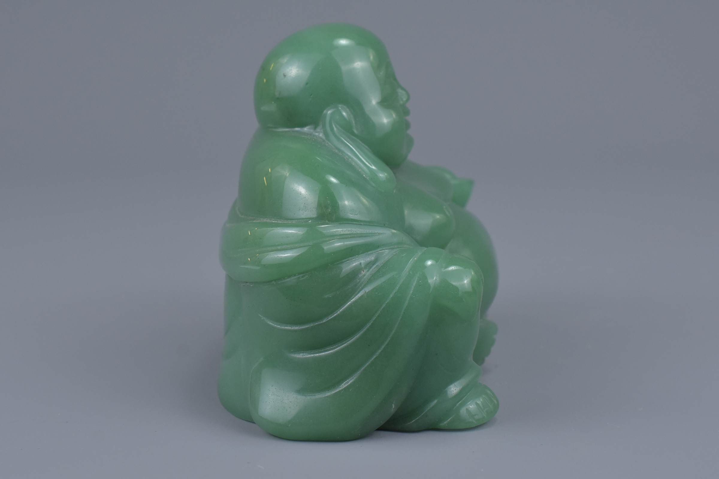 A Chinese carved green jade figure of a laughing B - Image 4 of 5