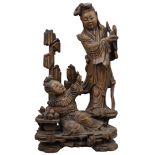 A Chinese 19th C. carved hardwood figure of two Immortals