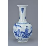A Chinese 18/19th C. blue and white porcelain vase