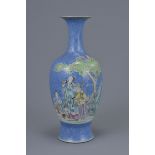 A Chinese early 20th C. Republic period sgraffito blue ground vase