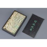 A Chinese early 20th C. complete bone on bamboo Mahjong set