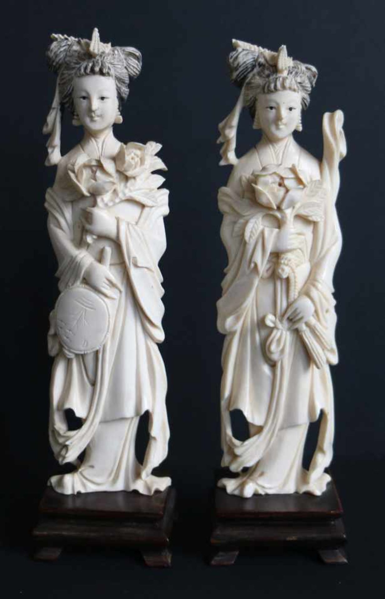 2 ivory women with lotus flower on wooden baseEarly 20th century Certificate Arts Ivory ExpertsH