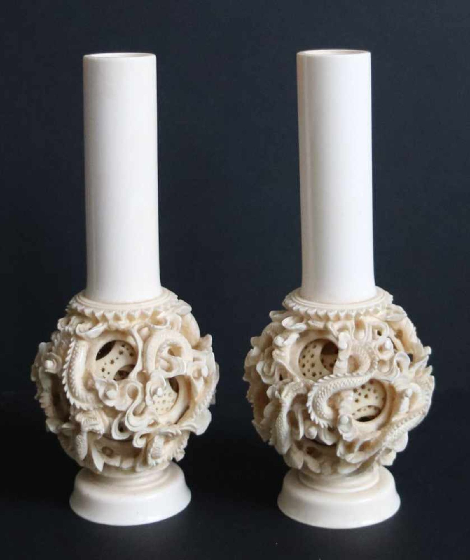 2 Chinese candlesticks with puzzle ball1920 Certificate of Arts Ivory ExpertsH 15.5 cm