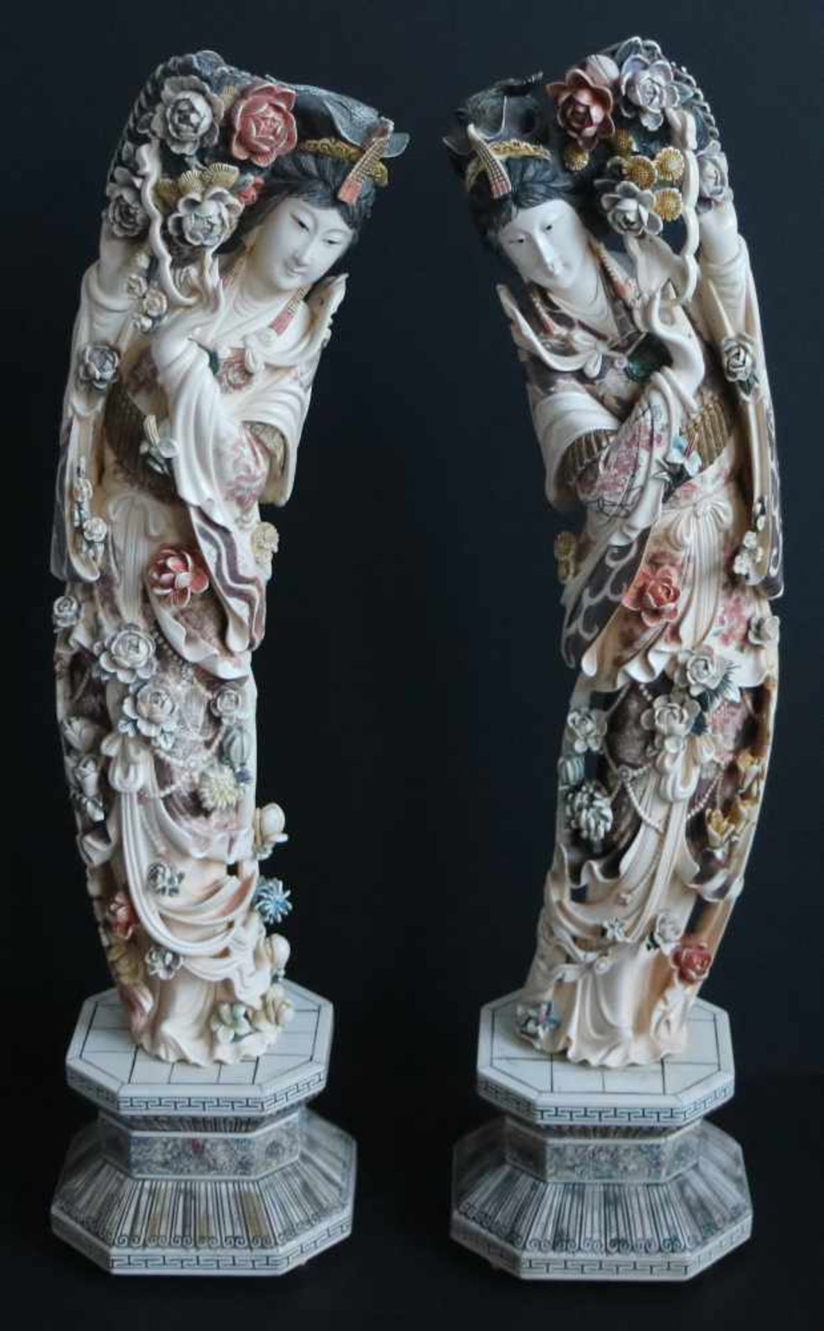 Large symmetrical pair of He Xian Gu with flowers in ivory With polychrome and dated around 1900 -