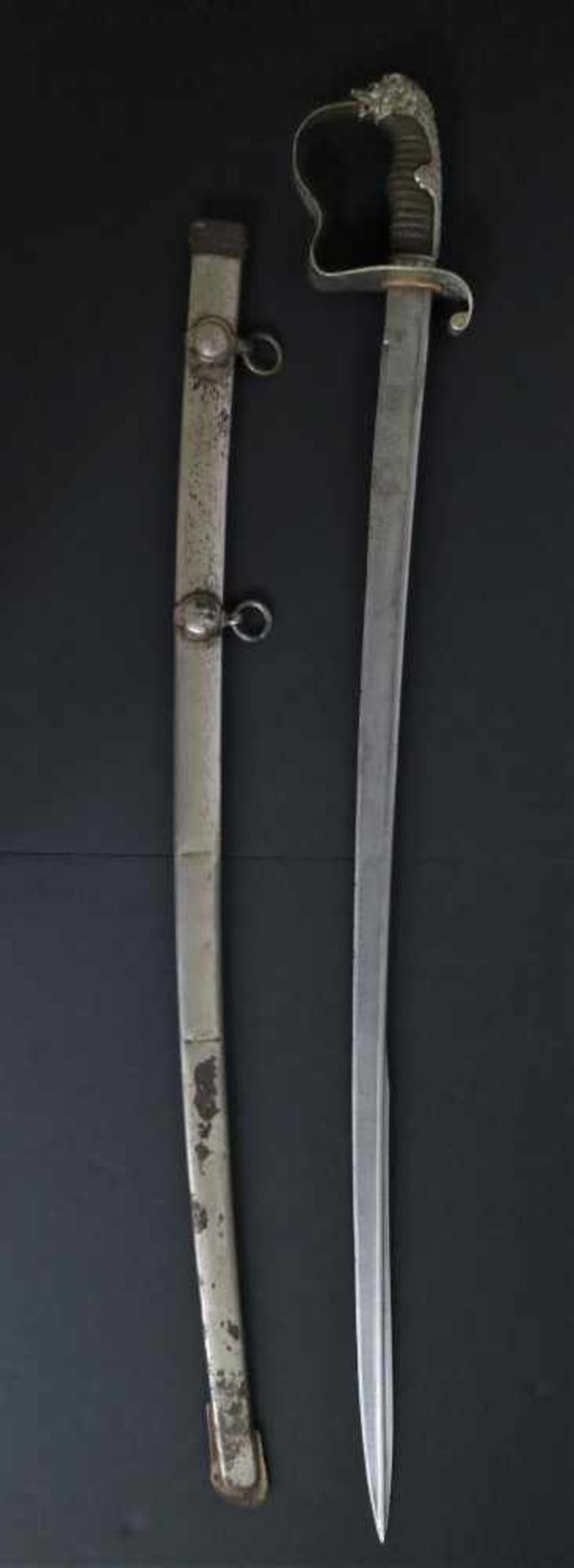 German saber with white metal lion's head