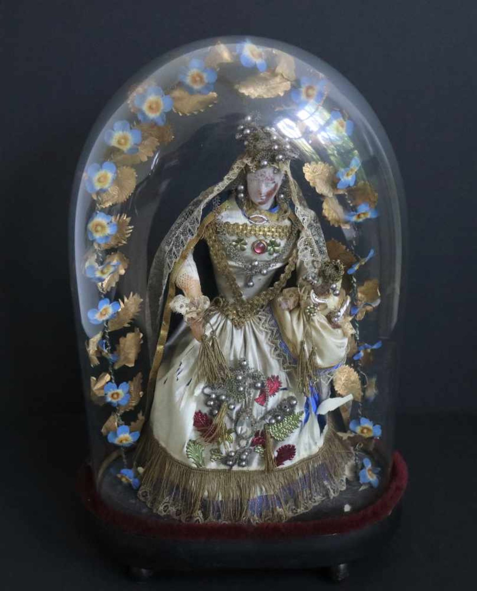 Madonna under glass bell jar