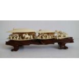 Ivory carving depicting rural scenes inside two clams China, around 1930 L 23,5 cm (without base)