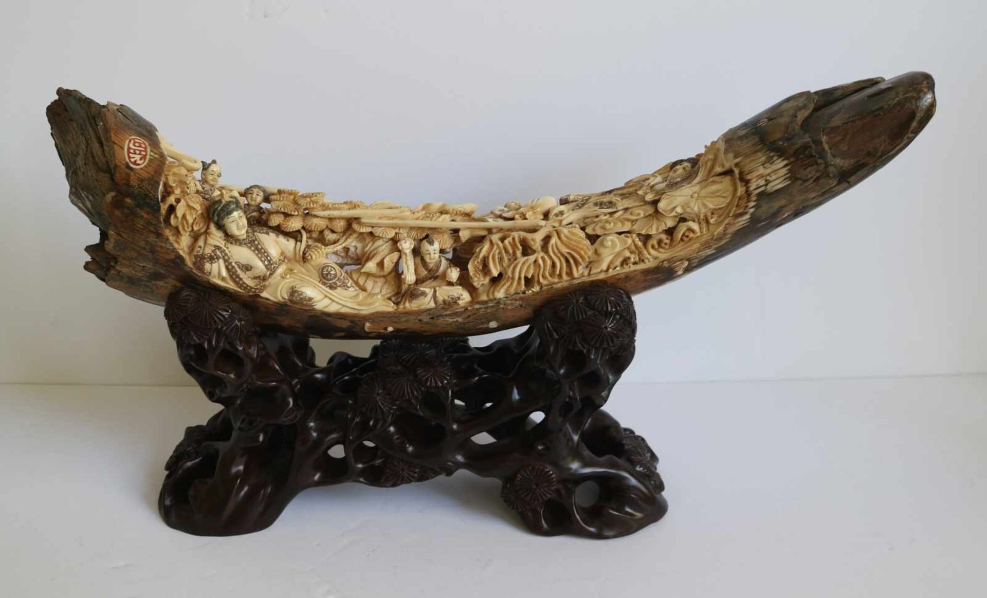 Intricately carved mammoth tusk as a figural group China around 1970 L 43,5 cm Signed in the tusk
