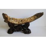 Intricately carved mammoth tusk as a figural group China around 1970 L 43,5 cm Signed in the tusk