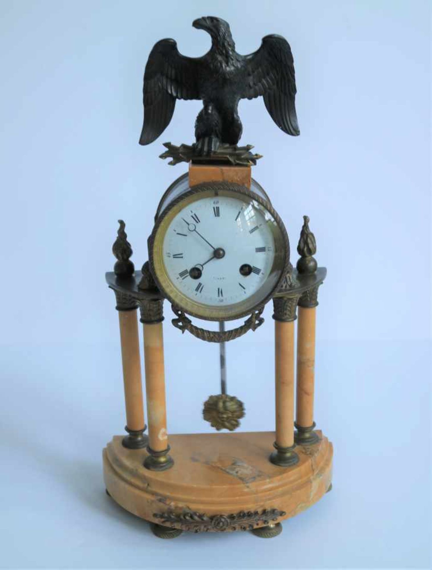 Empire Clock with eagle and Louis XVI elements, 19th century, Paris work sold in Ghent H 41,5 cm