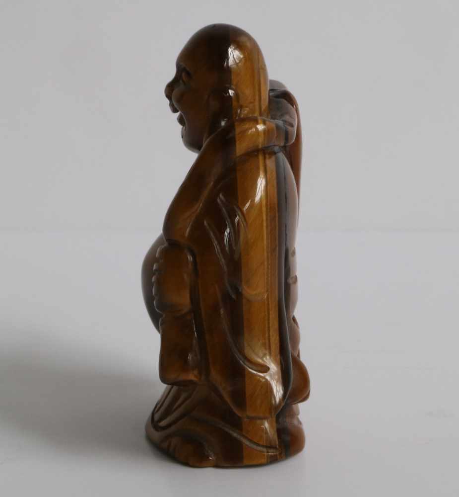 Netsuke Tiger's eye Ivory figure of a Hotei, carrying a gourd and knapsack Japan early 20th century - Image 2 of 5