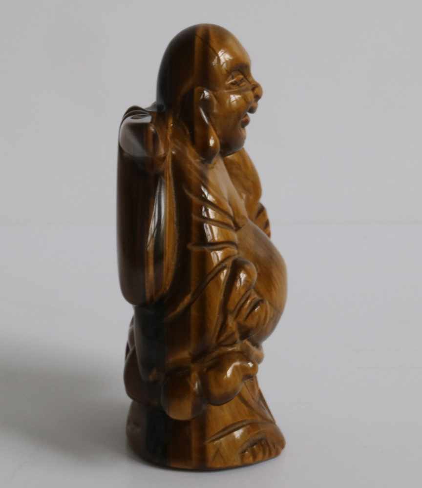 Netsuke Tiger's eye Ivory figure of a Hotei, carrying a gourd and knapsack Japan early 20th century - Image 4 of 5