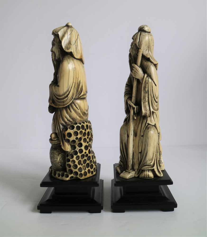 A pair of mammoth ivory arhats China 1970's H 24 cm (with base) - Image 2 of 4