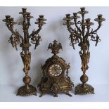 Bronze clock with 2 candlestick holders bronze clock with 2 candlesticks H 47 en 71 cm 2 large