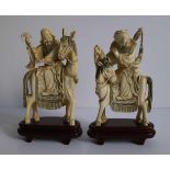 Pair immortals on horseback China, Republic period H 30,5 cm + 3,5 cm (sokkel)