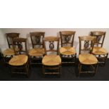 7 chairs wicker seat and harp motif