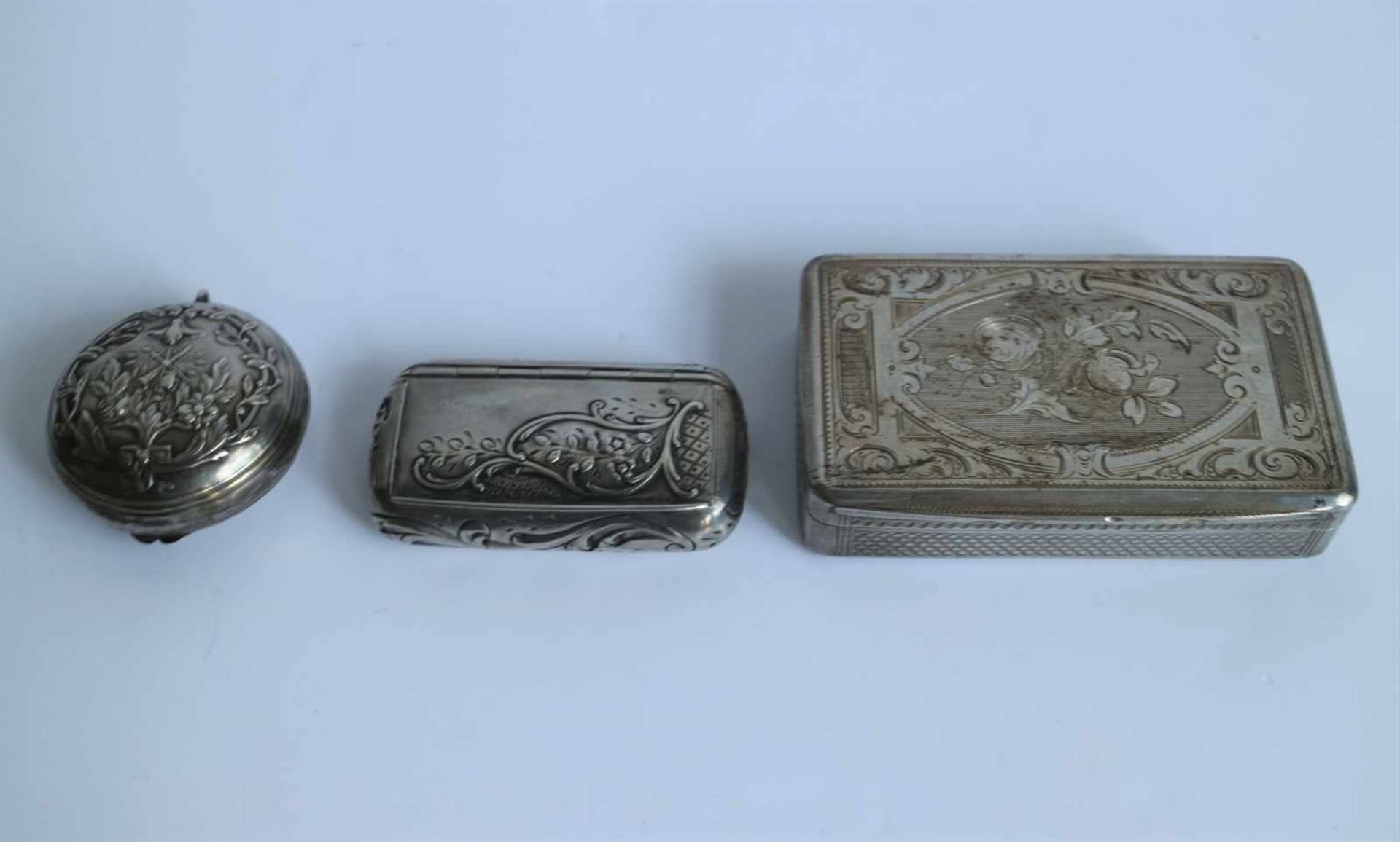 Silver pill boxes and a snuff box Silver snuff box Vienna 1864, silver French pill box 19th century