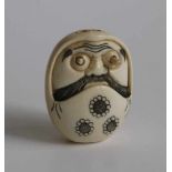 Netsuke Ivory Daruma depicting Daruma with popping eyes Japan TAISHO period L 4 cm small damage to