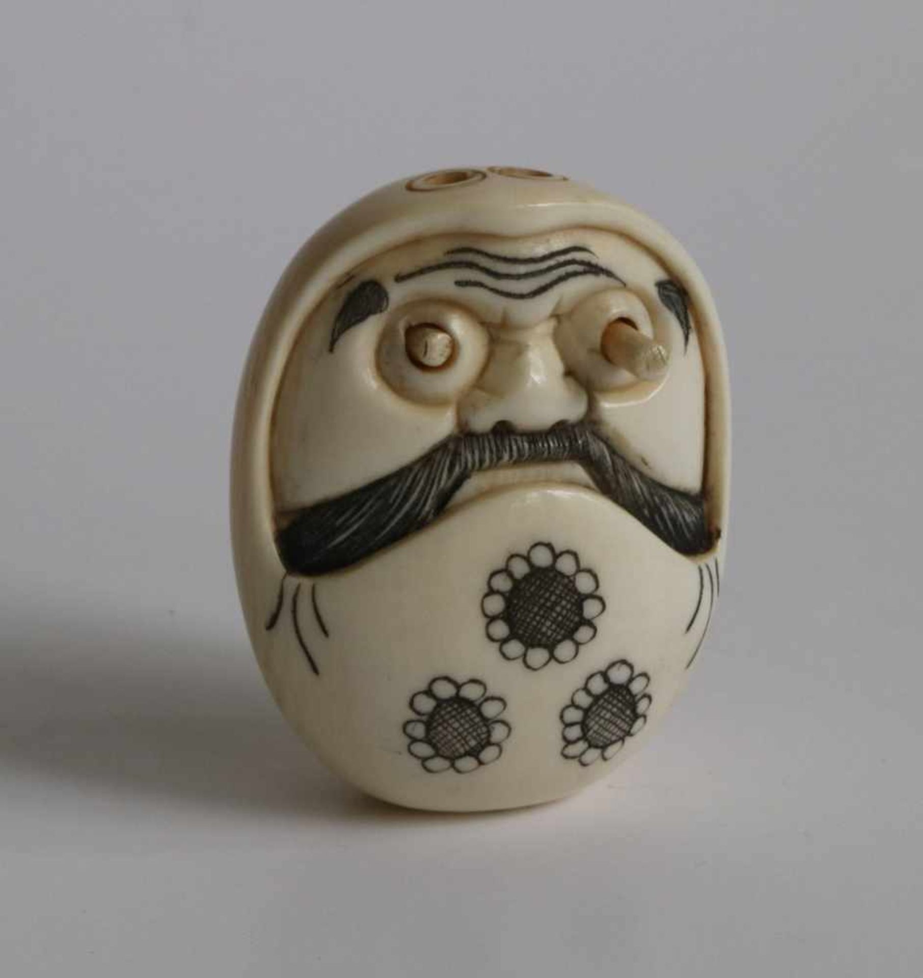 Netsuke Ivory Daruma depicting Daruma with popping eyes Japan TAISHO period L 4 cm small damage to