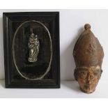 Wooden saint's head + silver Madonna Wooden saint's head + silver Madonna H 18 en 8 cm