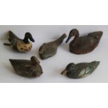 Lot of antique decoy ducks 5 pieces with polychromy B 28 tot 36 H 10 tot 18 cm