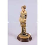 A "Costume Passion" ADL Figurine of a Lady with Signature