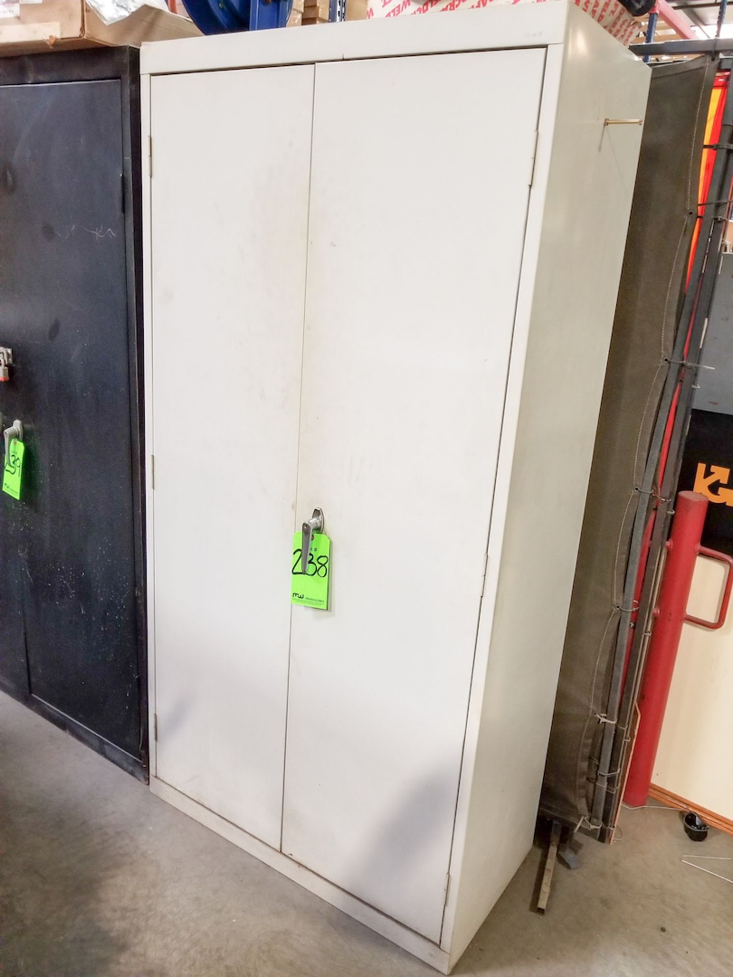 2-Door Metal Vertical Storage Cabinet with Contents to Include: Extension Cords, etc.