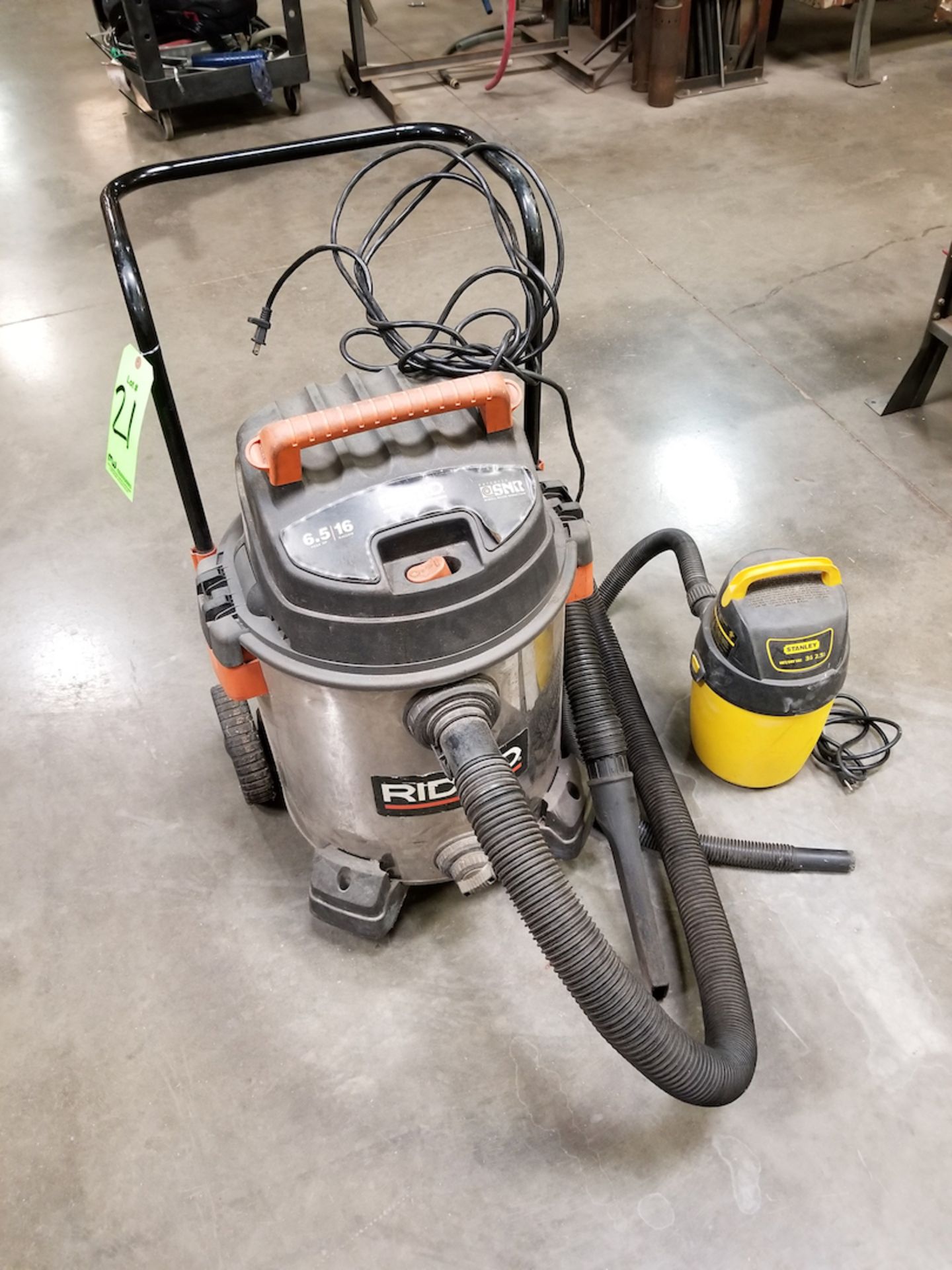 Assorted Vacuums to Include: (1) Ridgid 6.5HP Vacuum; (1) Stanley 3HP Wet/Dry Vacuum