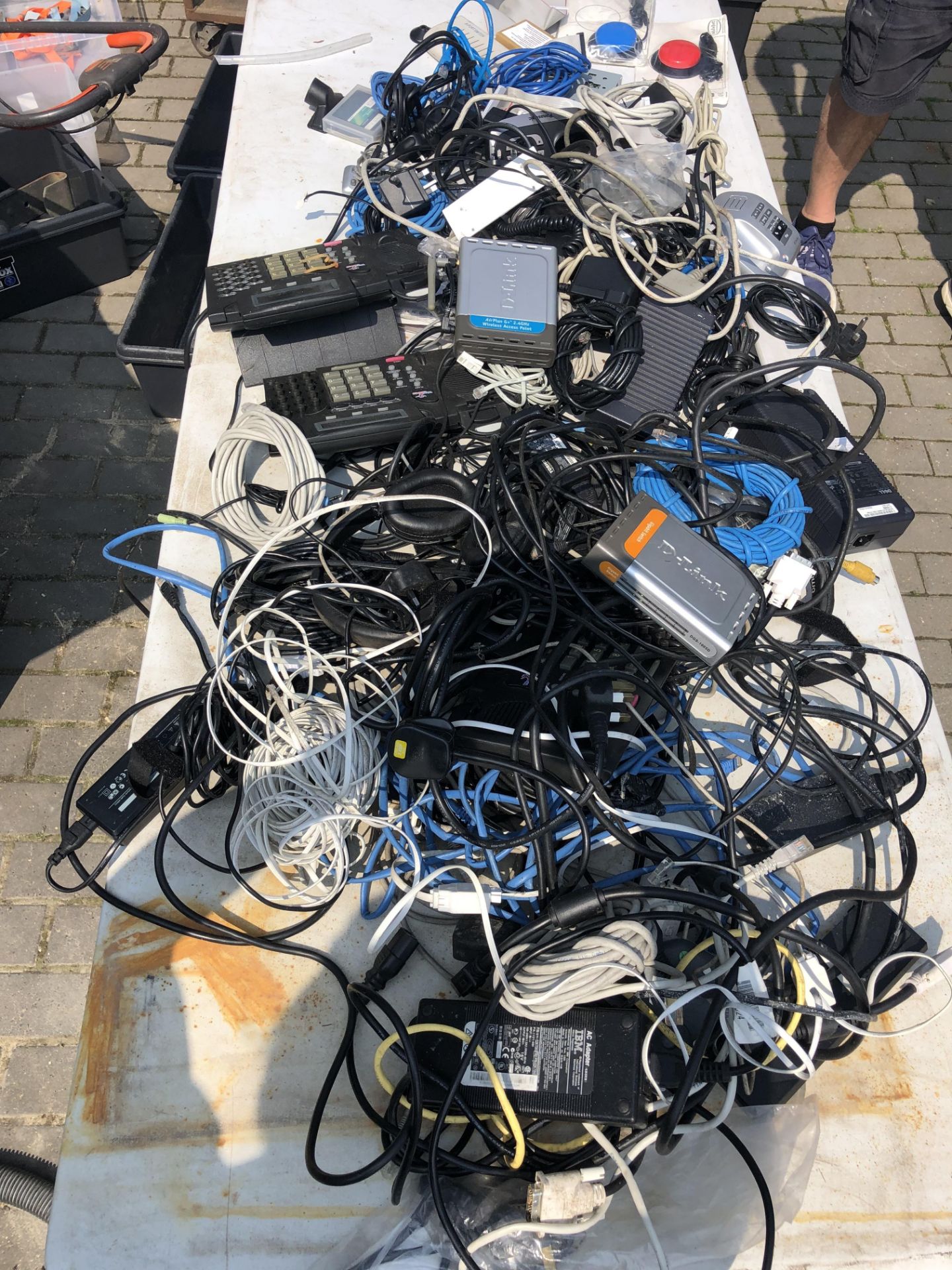 JOB LOT OF OFFICE EQUIPMENT INCLUDES PHONES MODEMS ETHERNET CABLES LAPTOP CHARGERS ETC
